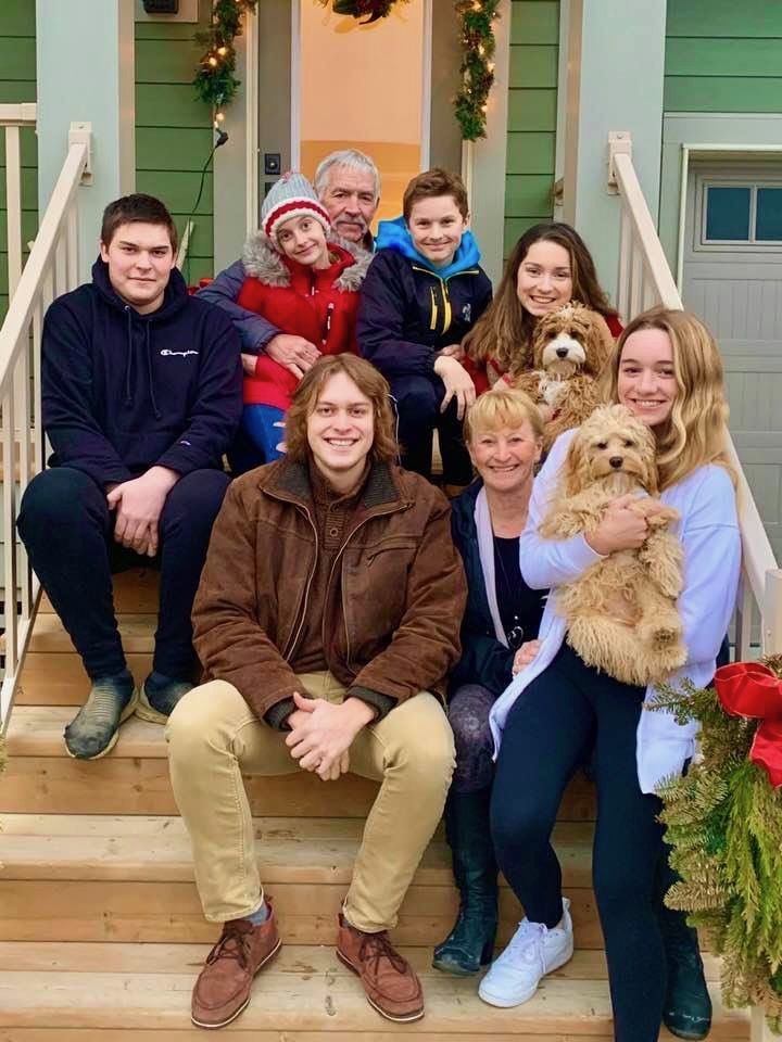 Steve and Shirley Geddes with the six pack of grandkids